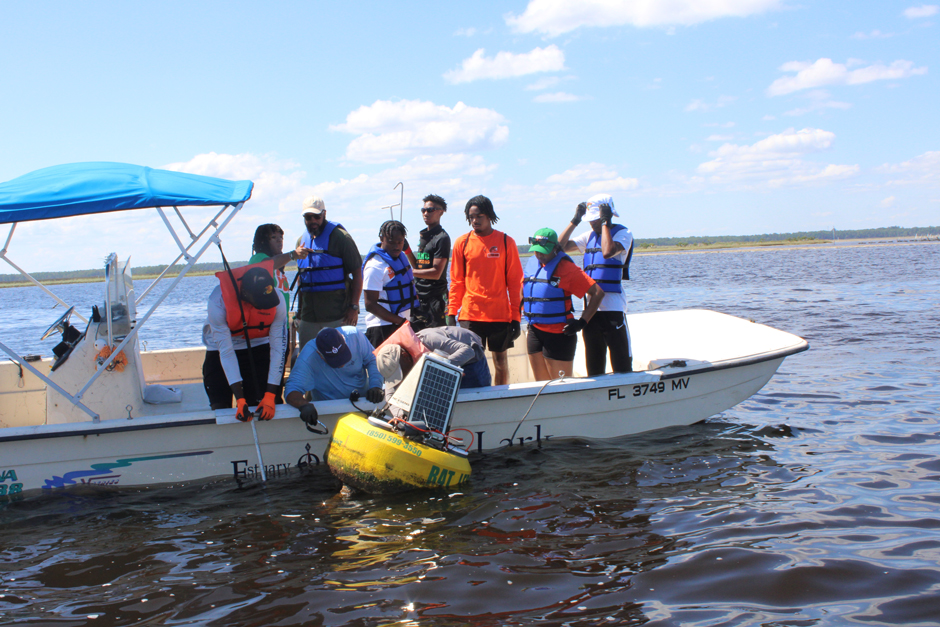 The FAMU-SOE NexSens buoy is deployed in an important oyster faming area. Through an ongoing relationship, students, researchers, and farmers, are all able to glean environmental insights from the data it provides. Credit: The School of the Environment.