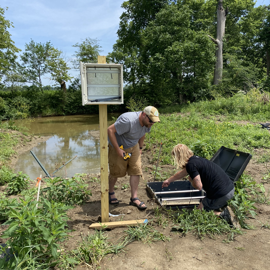 Instillation of an Onset HOBO MX2001 Water Level Logger in an outflow water control structure at Burntwood-Langenkamp Wetland in Grand Lake St. Marys Watershed. 