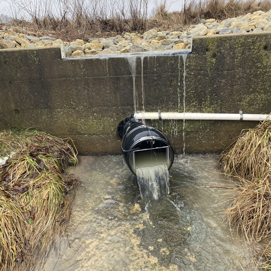 Flow event at the cascading grass waterway. Flows through the tile are measured using a Stingray AV sensor and a Thelmar Weir coupled with water level logger data using an Onset HOBO. Flows over the concrete weir are measured using an Onset HOBO.