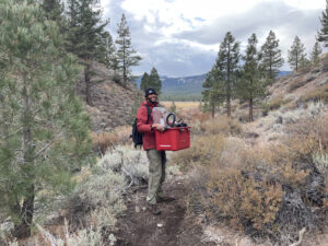 UNR graduate student Dre Presswood carrying out the Blaszczak Lab s::can spectrolyser from an upper watershed location at the end of the 2024 field season. While the outlet of the watershed is monitored year-round, many upper watershed locations are inaccessible during the middle of the winter.