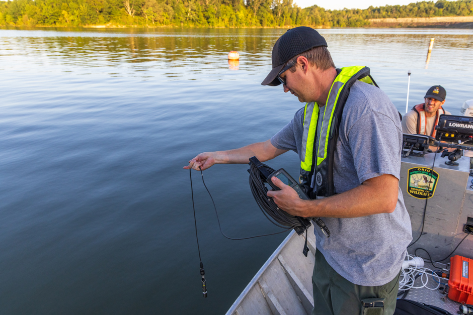 Inland Fisheries Research Unit staff taking a water profile prior to a survey.
