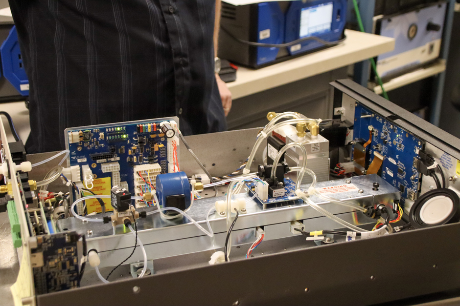 The interior of an ozone monitor used by Ecology at its flagship Seattle station. Operators maintain the pump and other components ahead of the summertime ozone season.