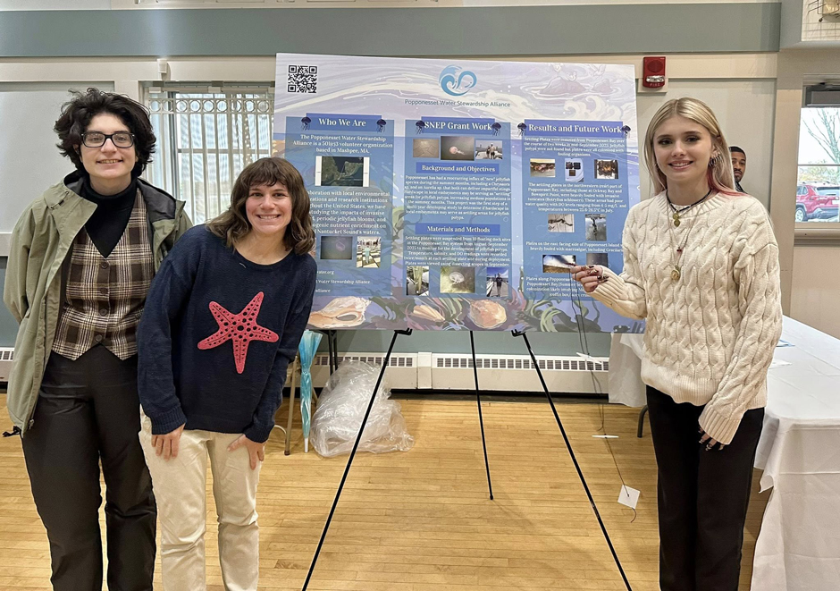 Nicole Corbett (center) with interns Lidi Vidal and Olivia Posk at the Southern New England Estuaries Project grant awards assembly presenting settling plate work in October 2025.