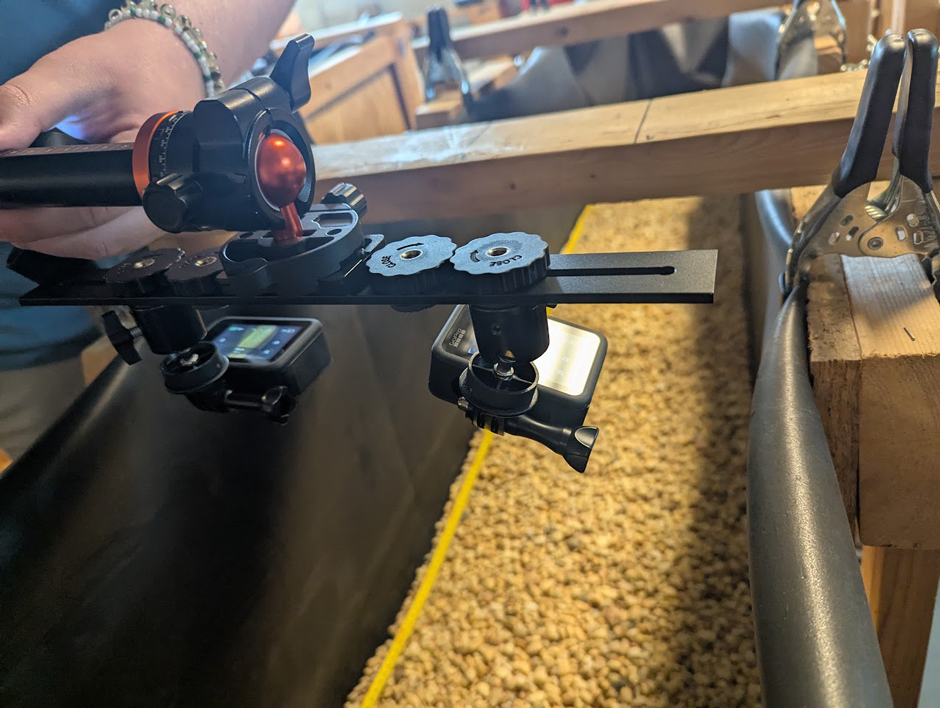 Two go-pros at different angles capture photos of the streambed.