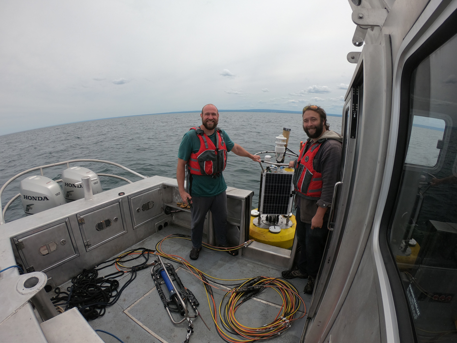 Brian Haas and Ben Szczygiel deploying the Dunkirk Buoy in Spring 2025.
