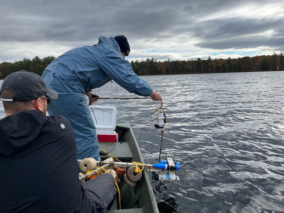 Researchers from RPI lowering a sensor string which includes light, temperature, dissolved oxygen, chlorophyll-a fluorescence, and dissolved organic matter fluorescence in Lake Giles.